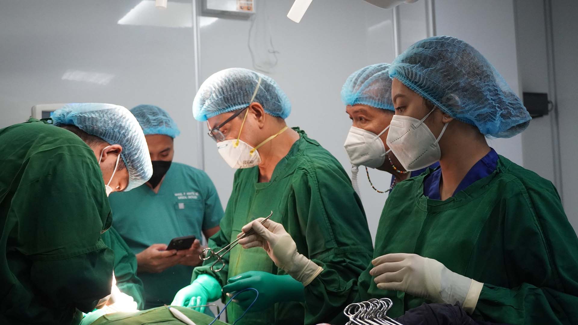 a surgical team performing a surgical operation