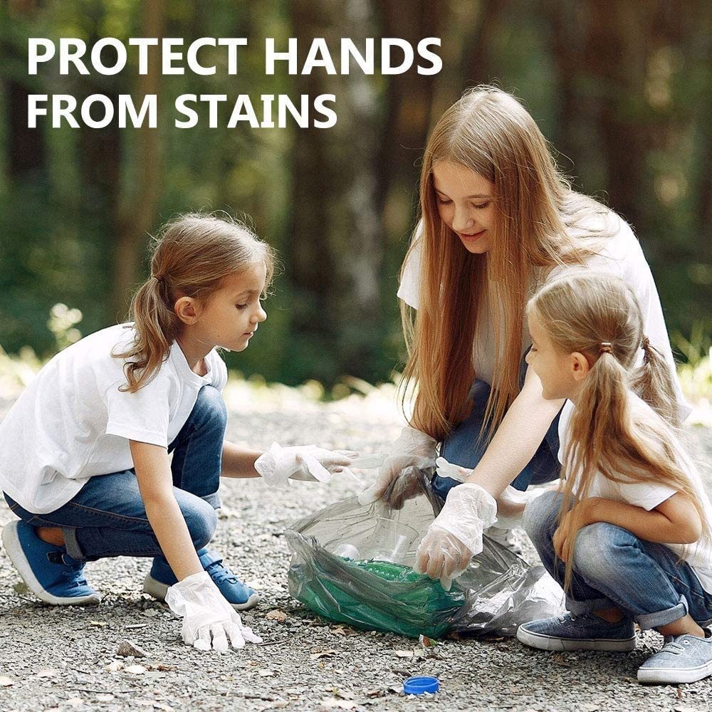 3 people wearing white gloves while picking up garbage outside